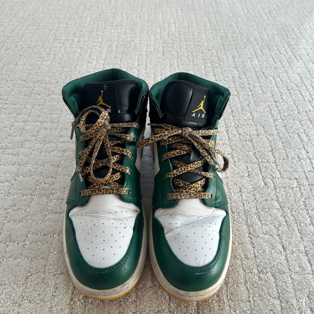 Women’s Green and White High-Top Nike Jordans with Leopard Laces